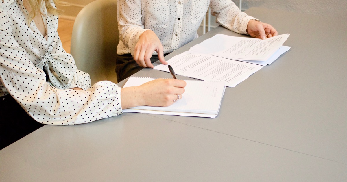 Women reviewing paperwork